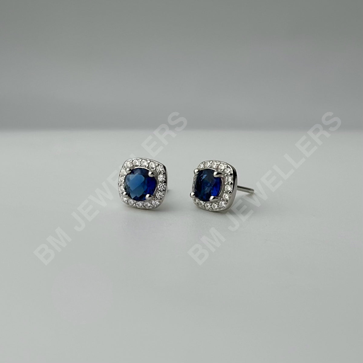 "The Cushion Blue Sapphire Halo Minimalist Set" by BM Jewellers