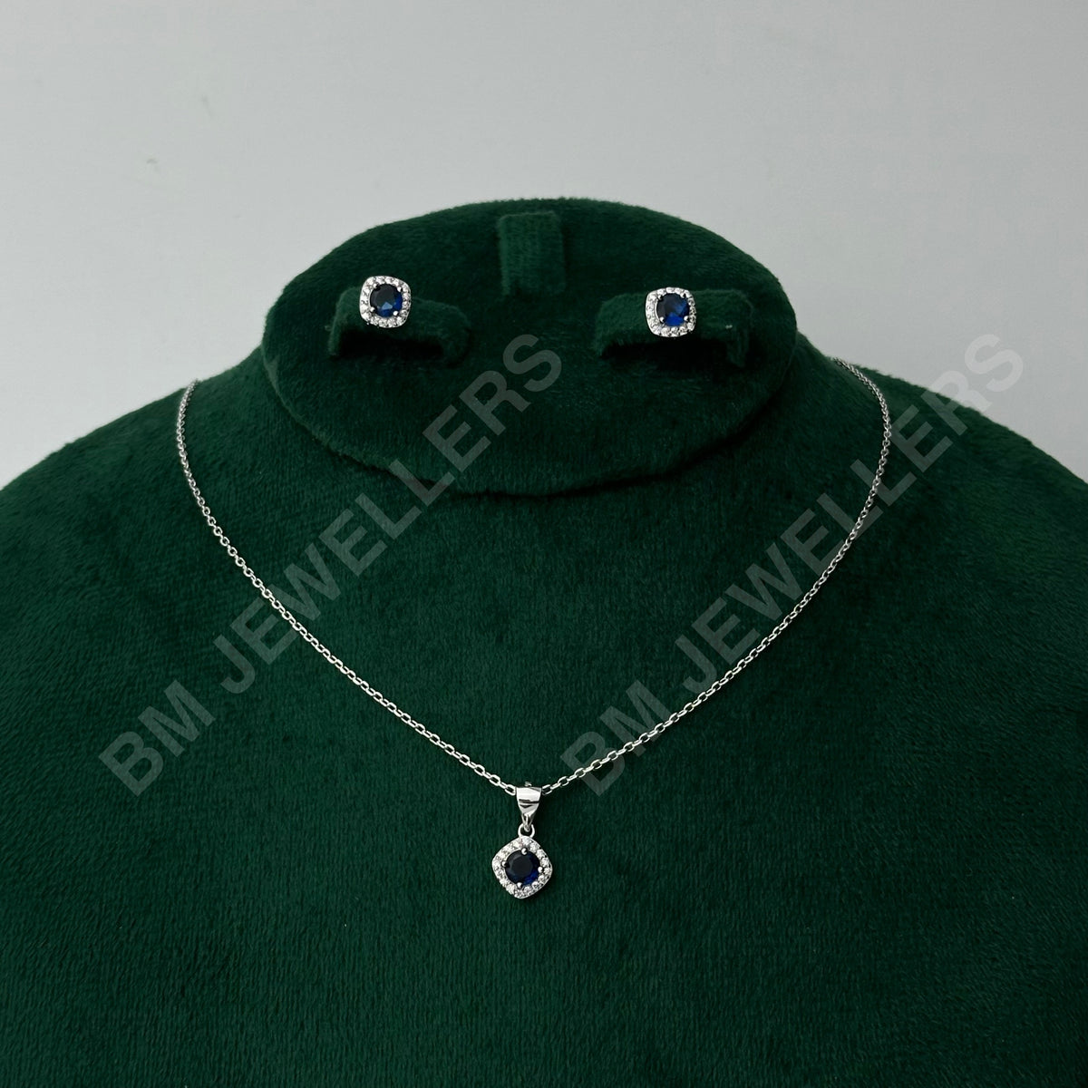 "The Cushion Blue Sapphire Halo Minimalist Set" by BM Jewellers
