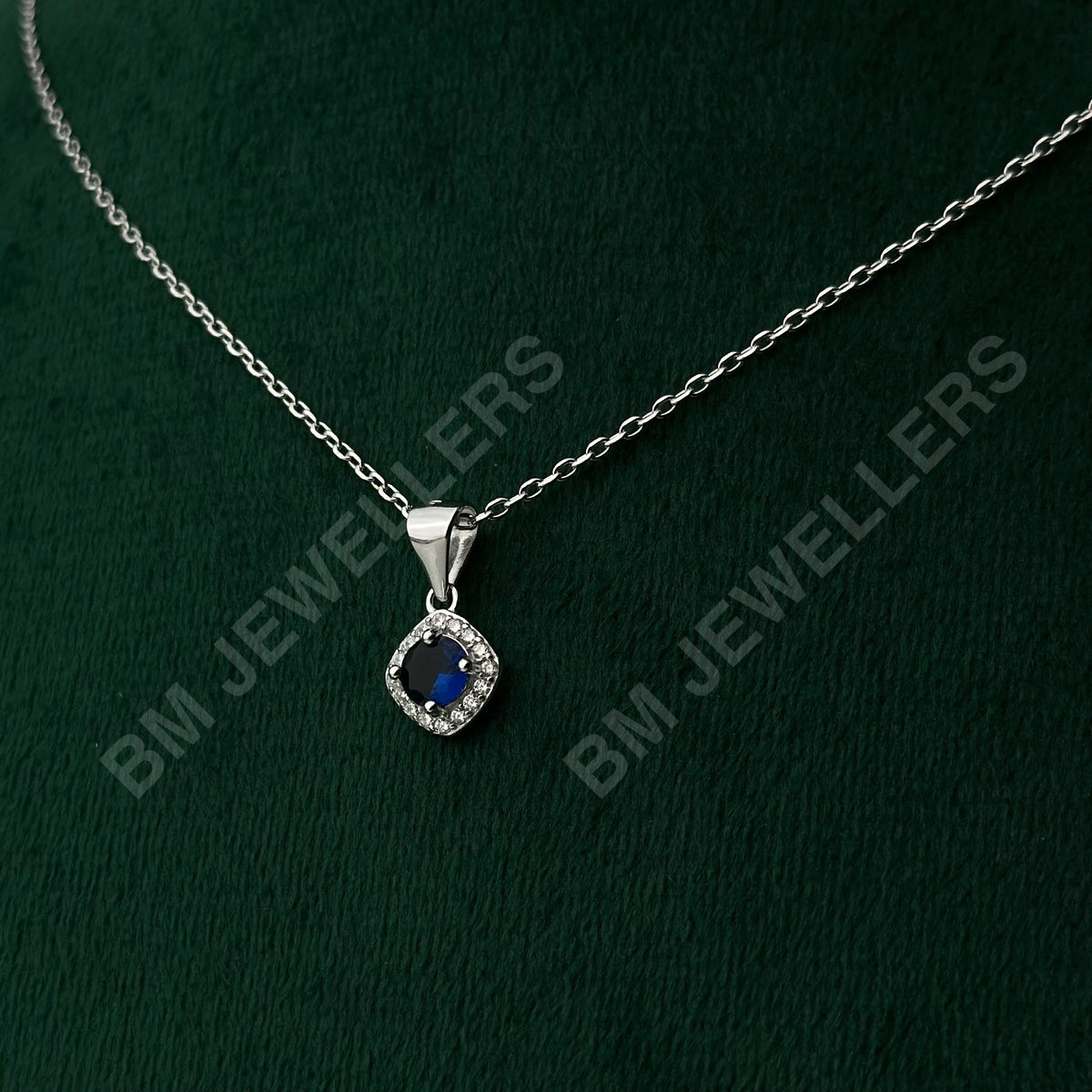 "The Cushion Blue Sapphire Halo Minimalist Set" by BM Jewellers