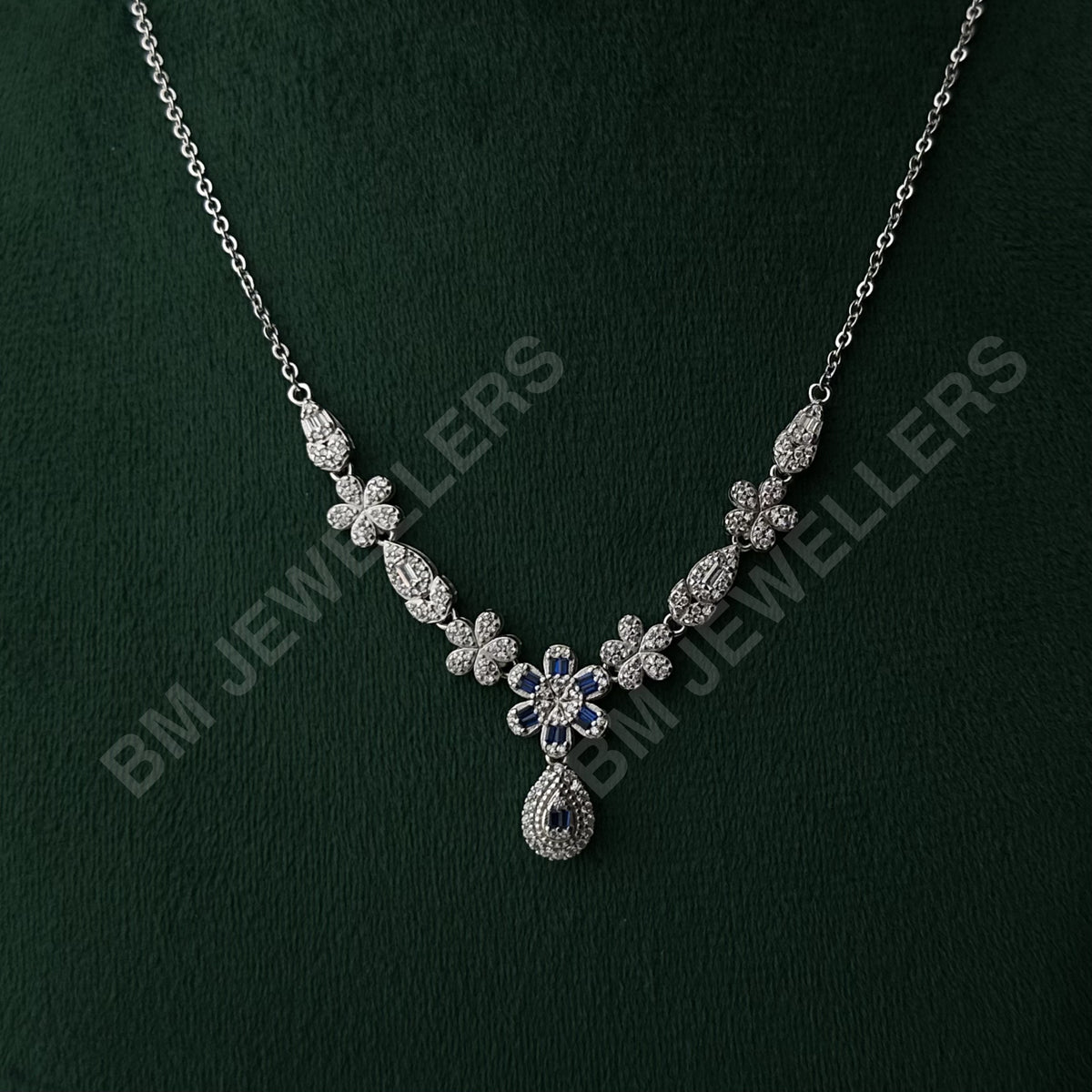 The Sapphire Flower Pear Halo Suite By BM Jewellers